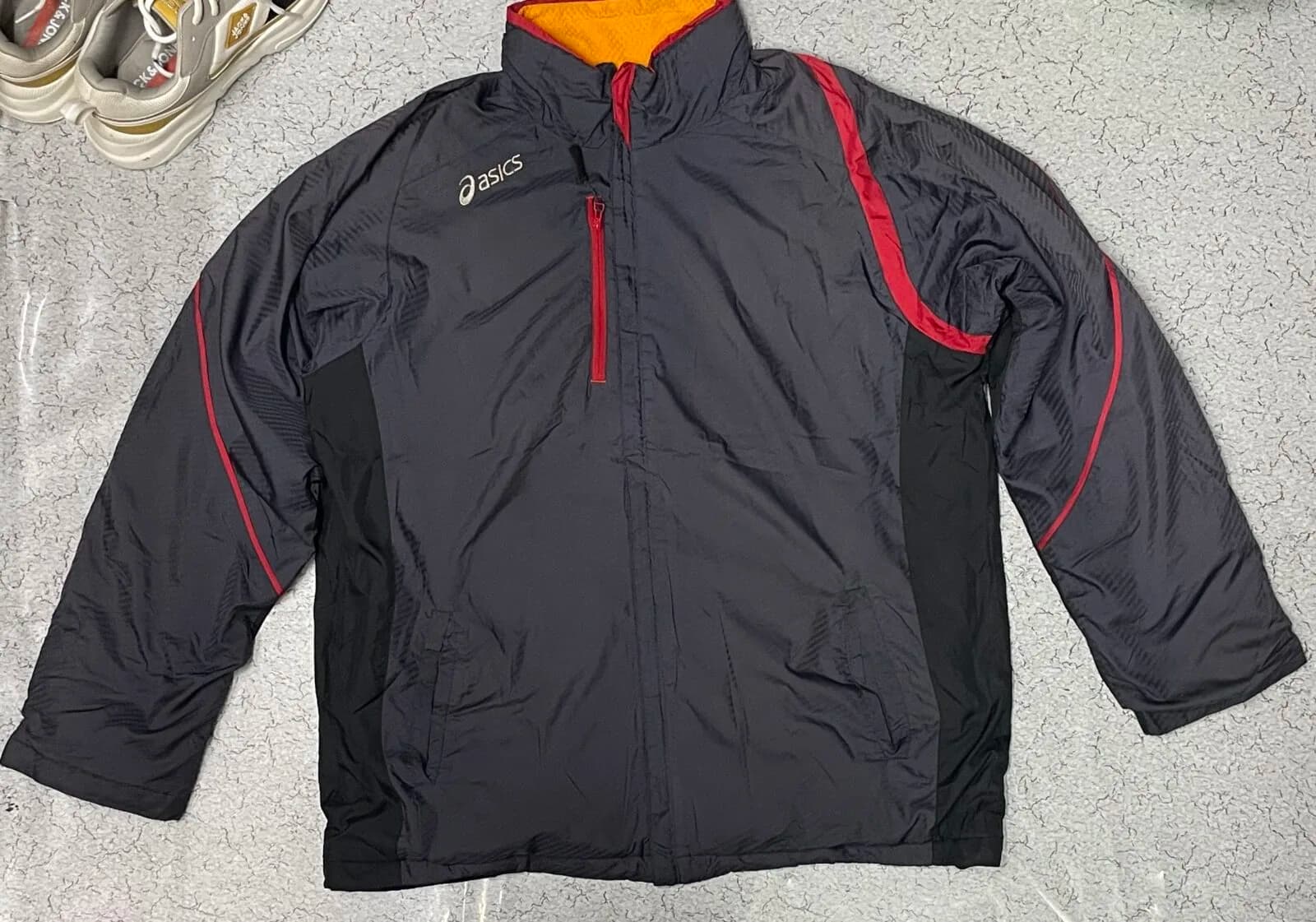 Asics Jacket front view