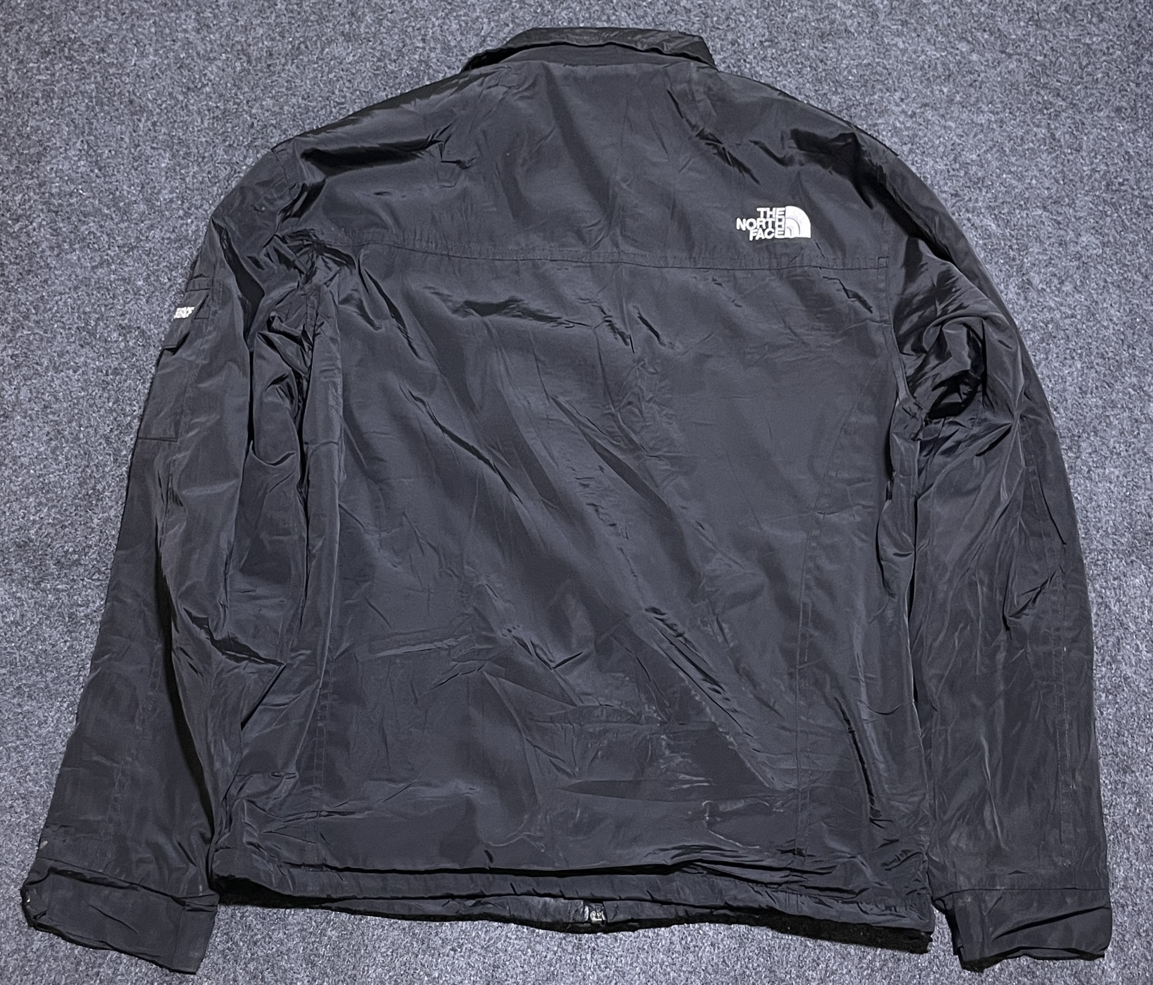 The North Face Black Windbreaker Jacket detail view
