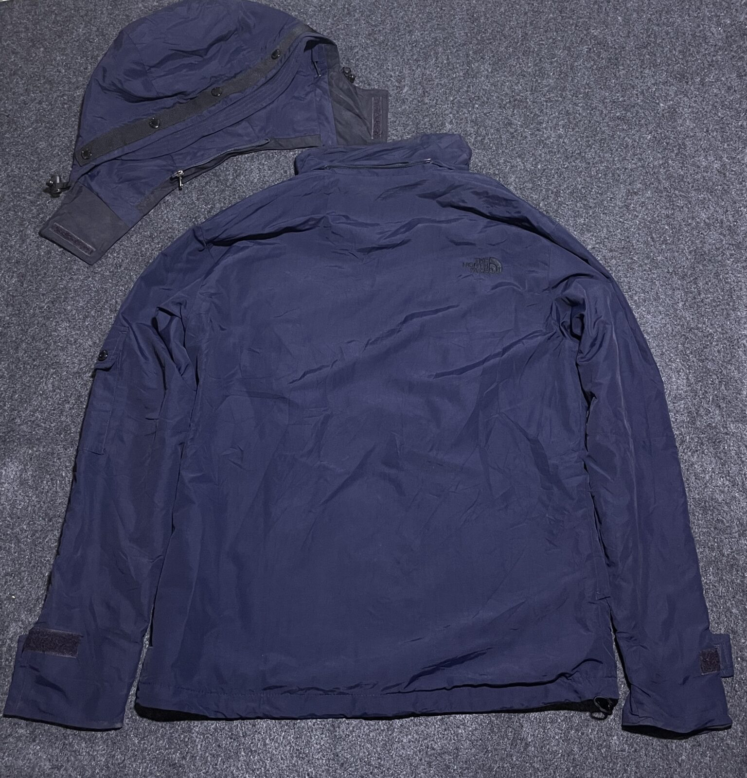 The North Face Navy Jacket back view