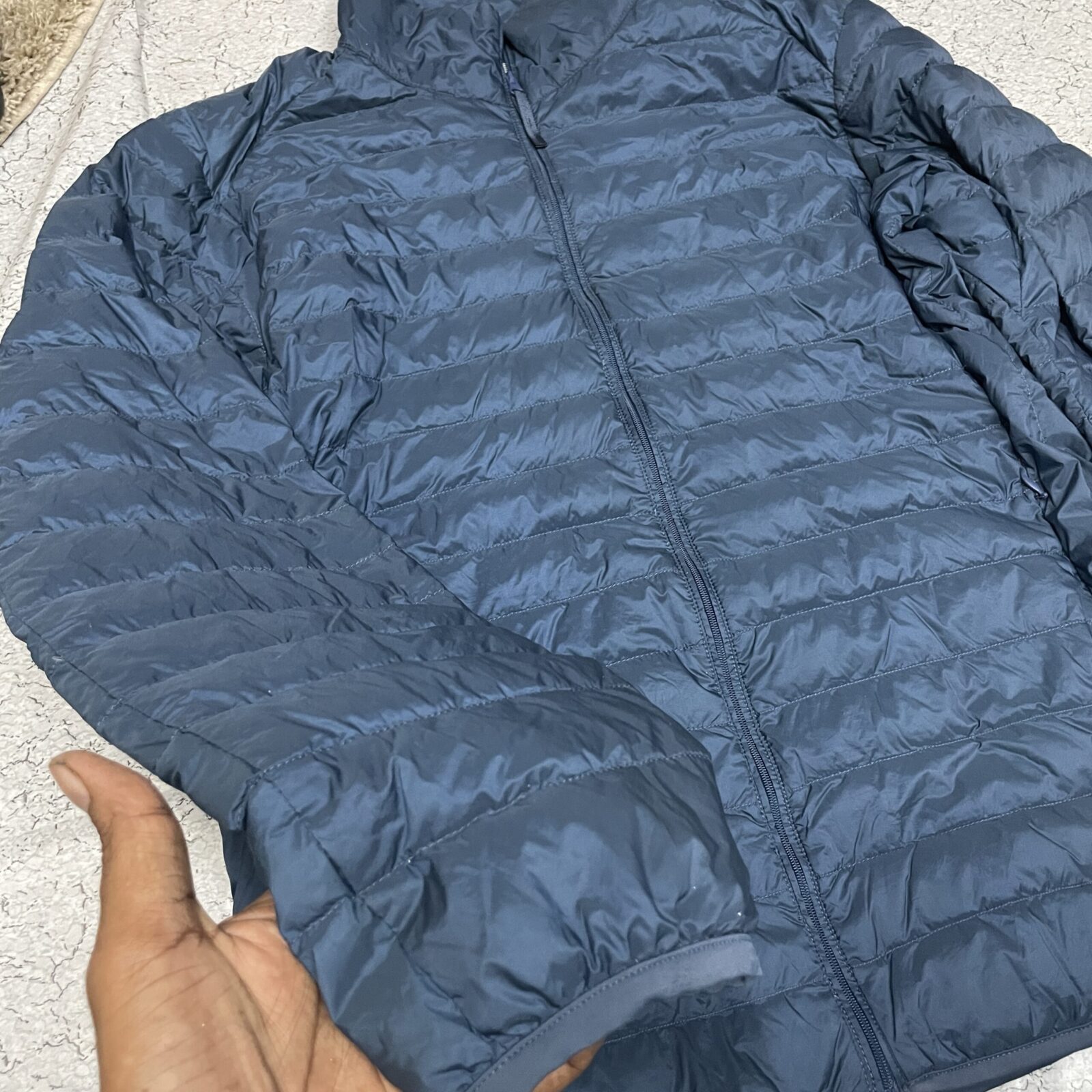 Uniqlo Navy Puffer Jacket detail view