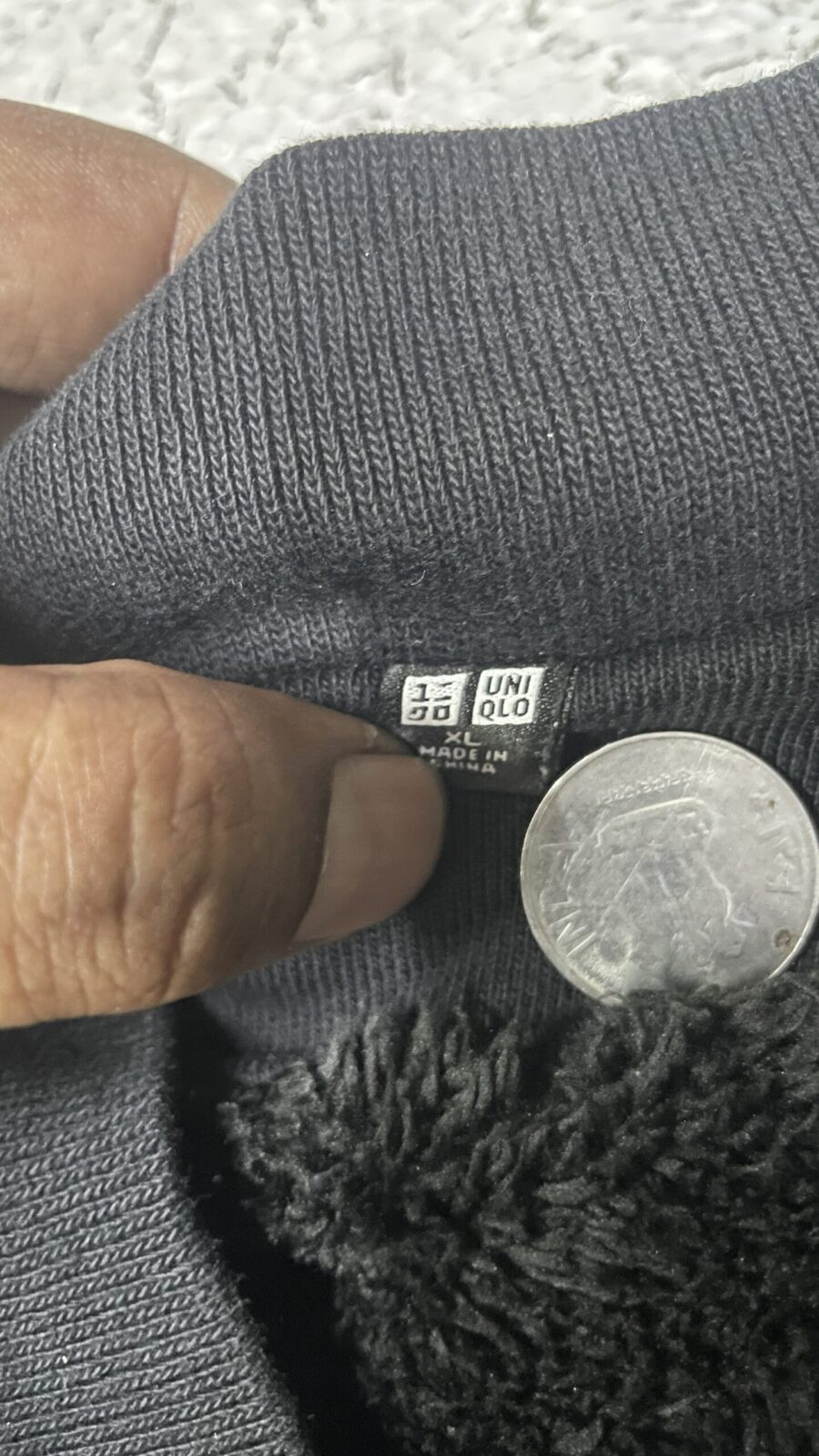 Uniqlo Black Sweater detail view