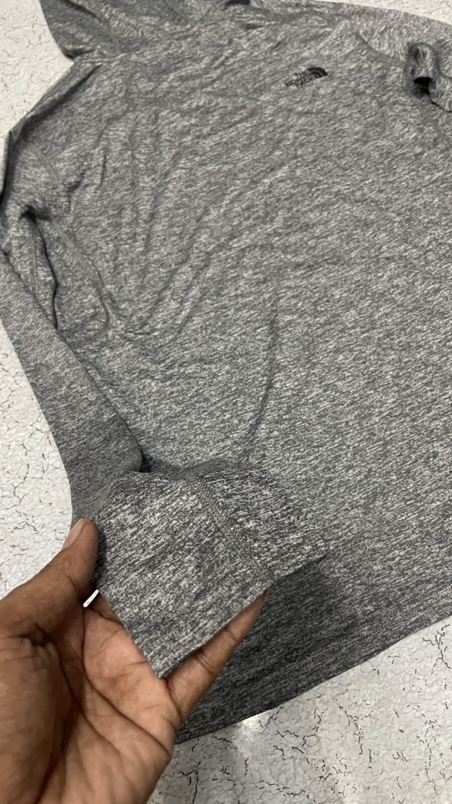 The North Face Grey Hoodie detail view