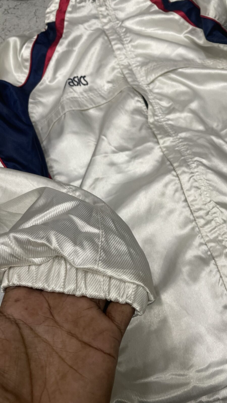 Asics Track Jacket detail view