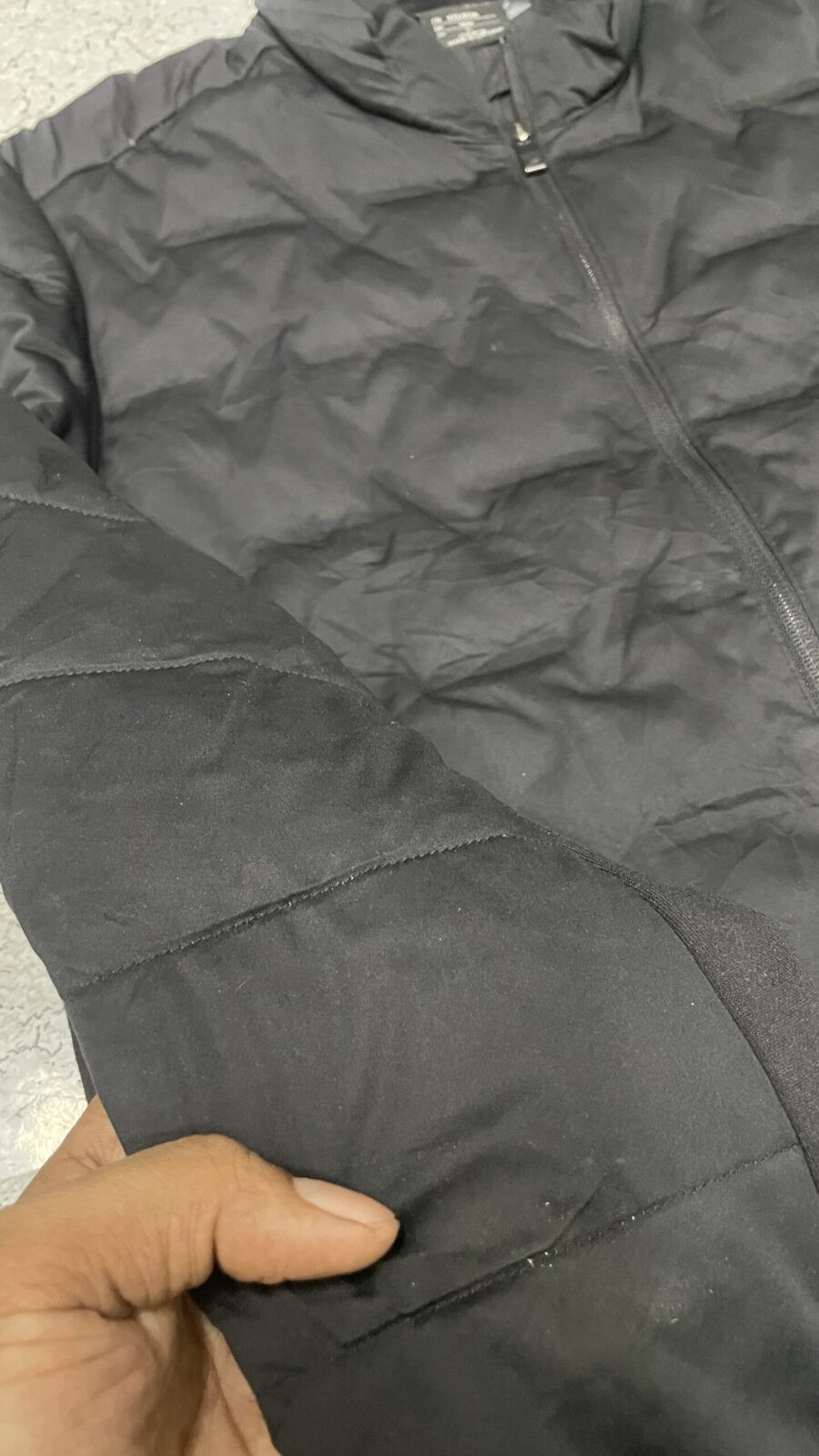 Sketchers Black Puffer Jacket detail view
