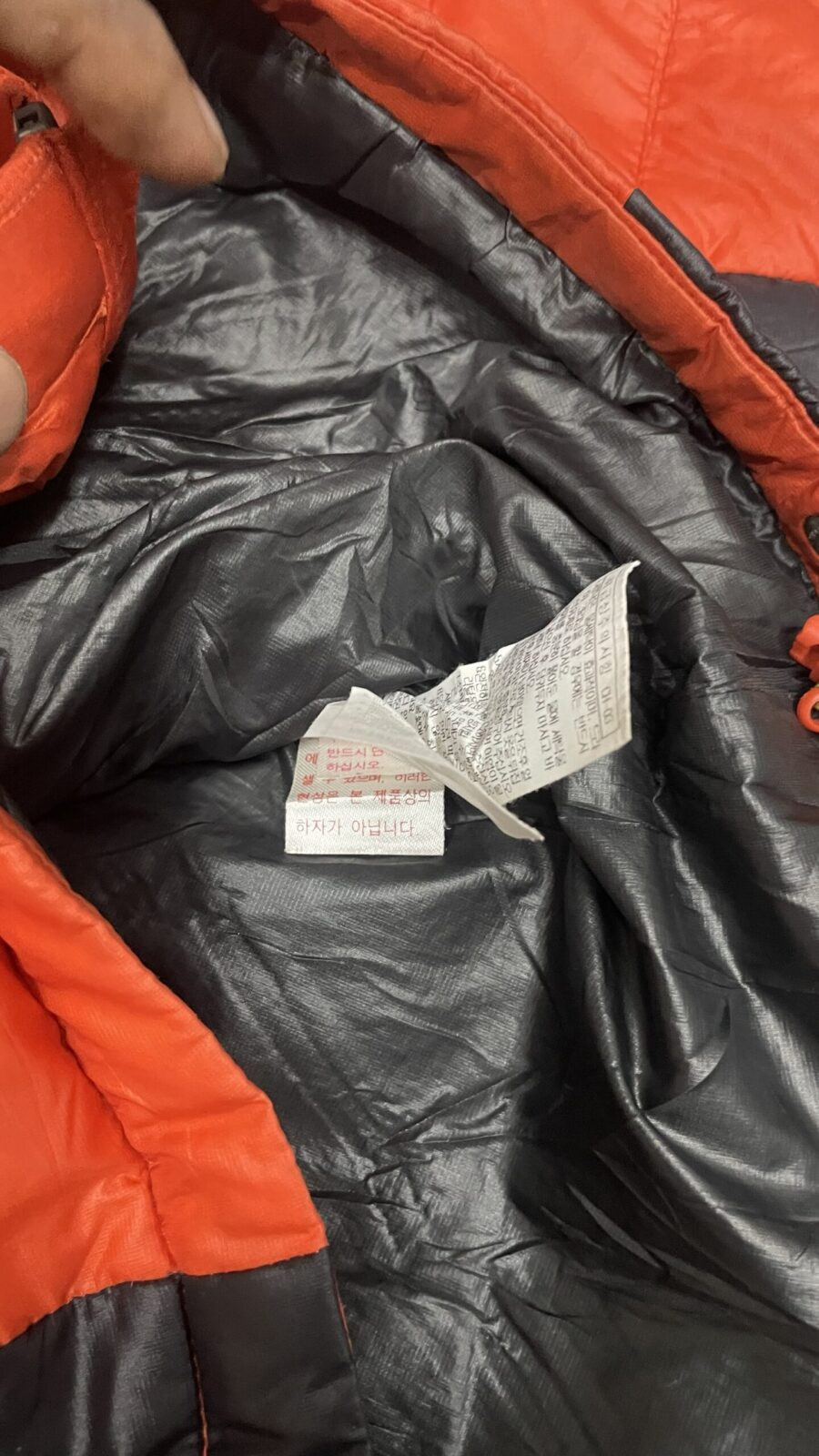 Millet Orange Puffer Jacket back view