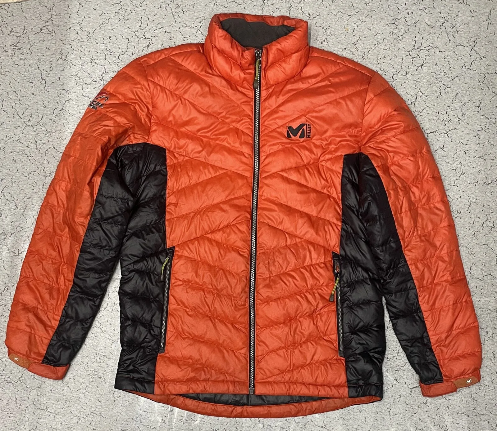 Millet Orange Puffer Jacket front view