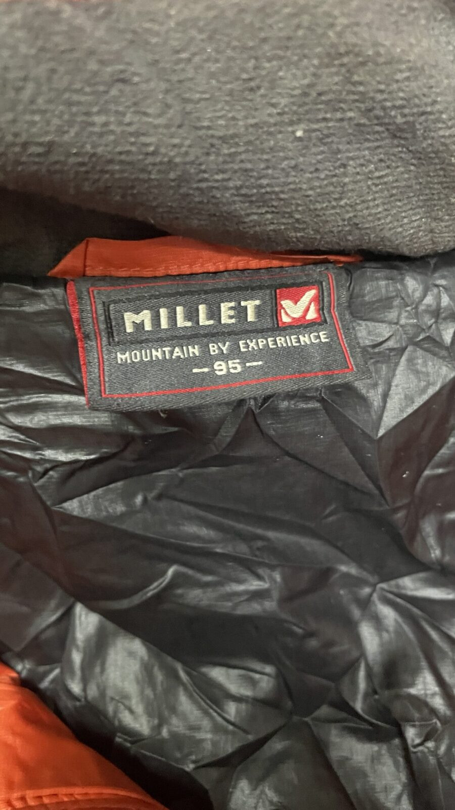 Millet Orange Puffer Jacket detail view