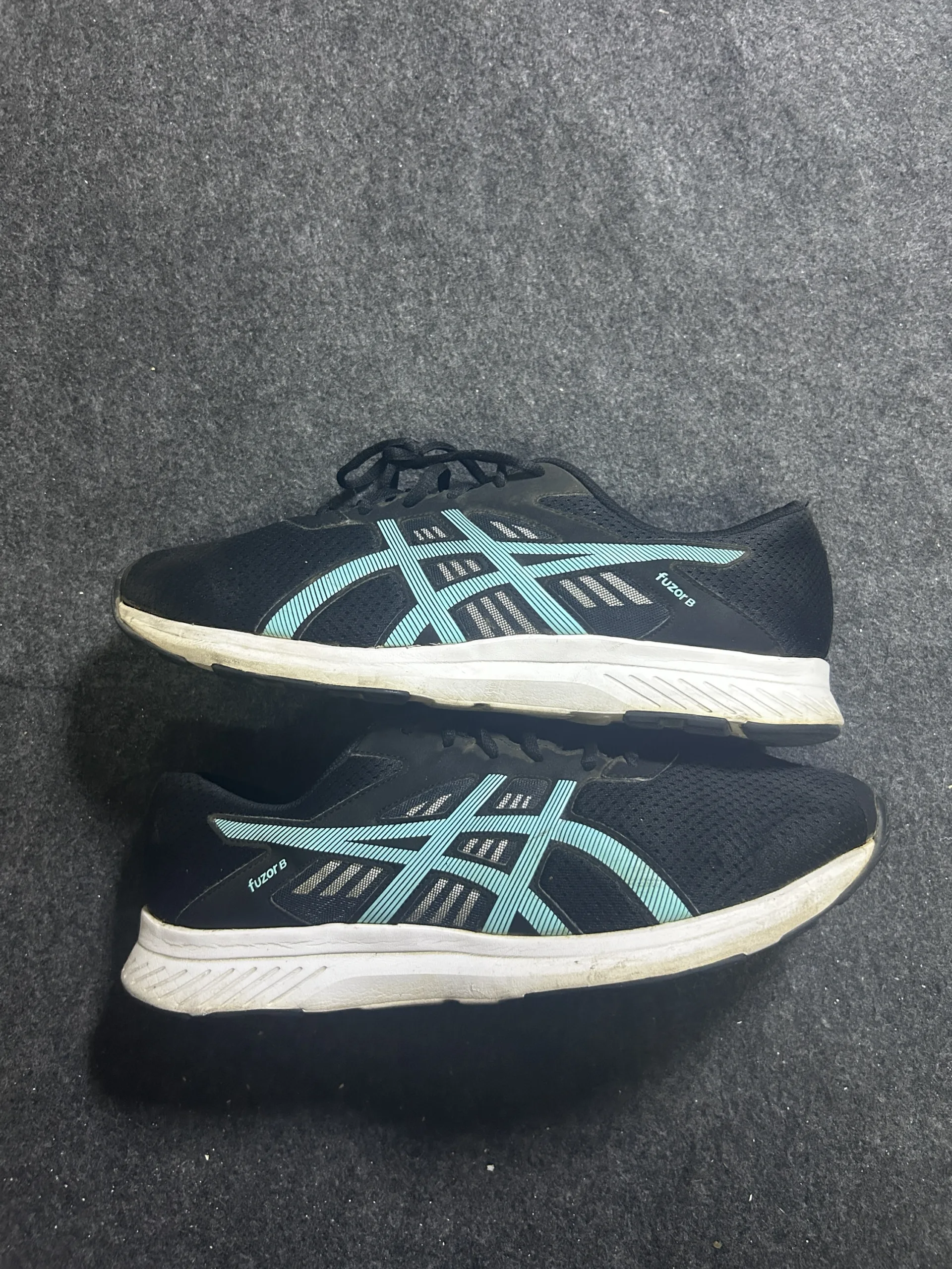 Asics Black simple front view