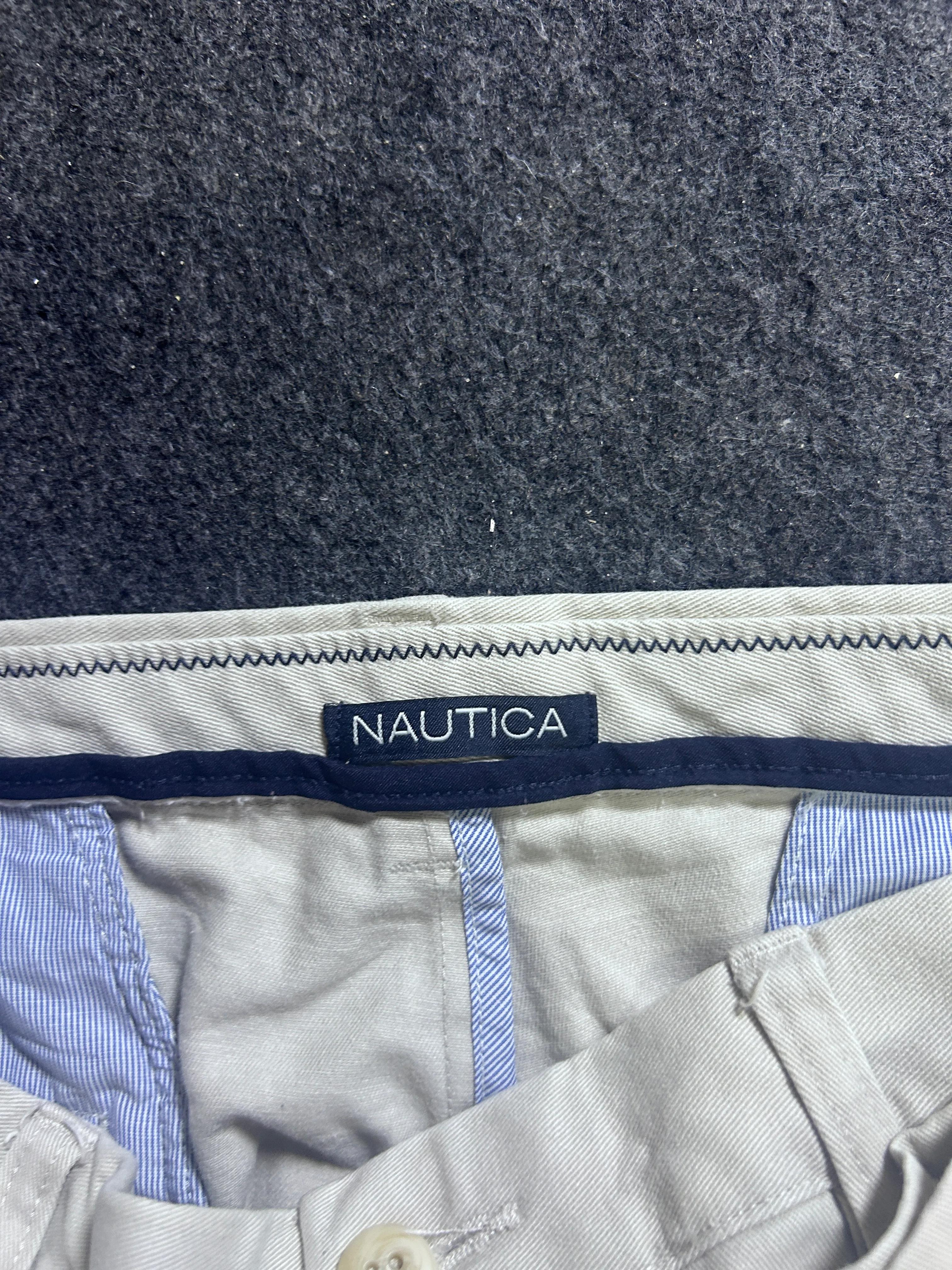 Beige Trousers detail view