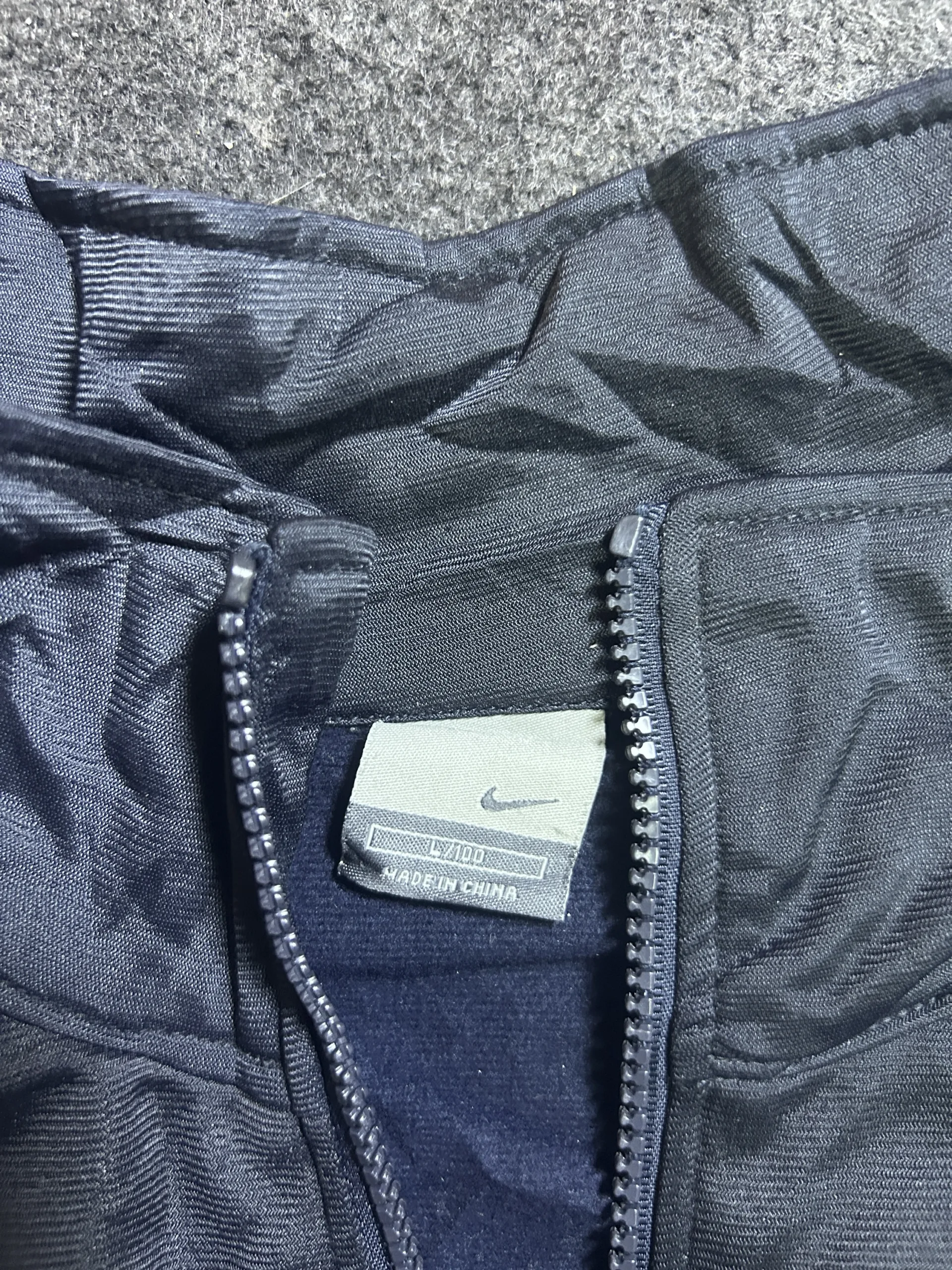 Nike White Track Jacket detail view