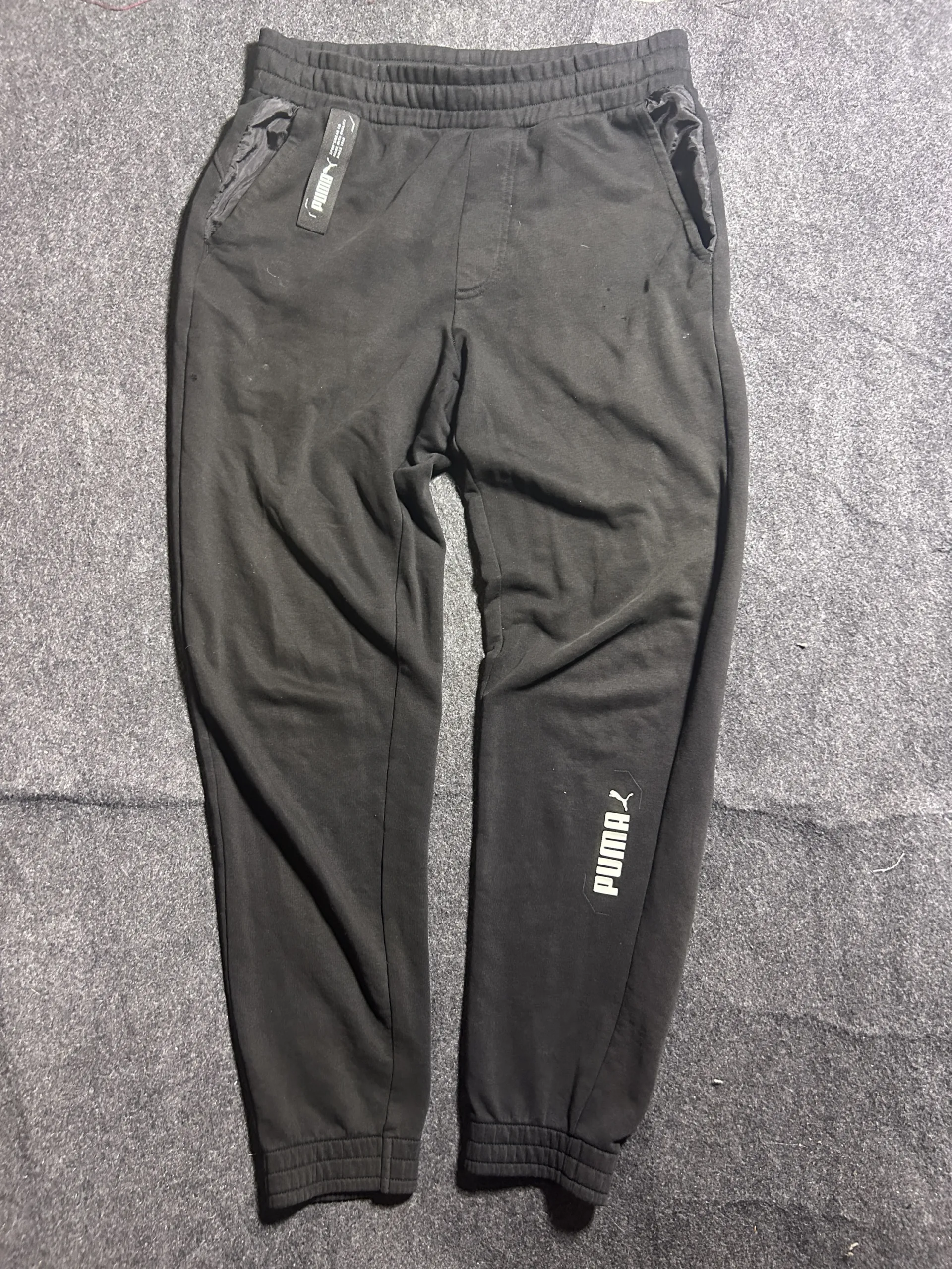 Puma Black Track Pants front view