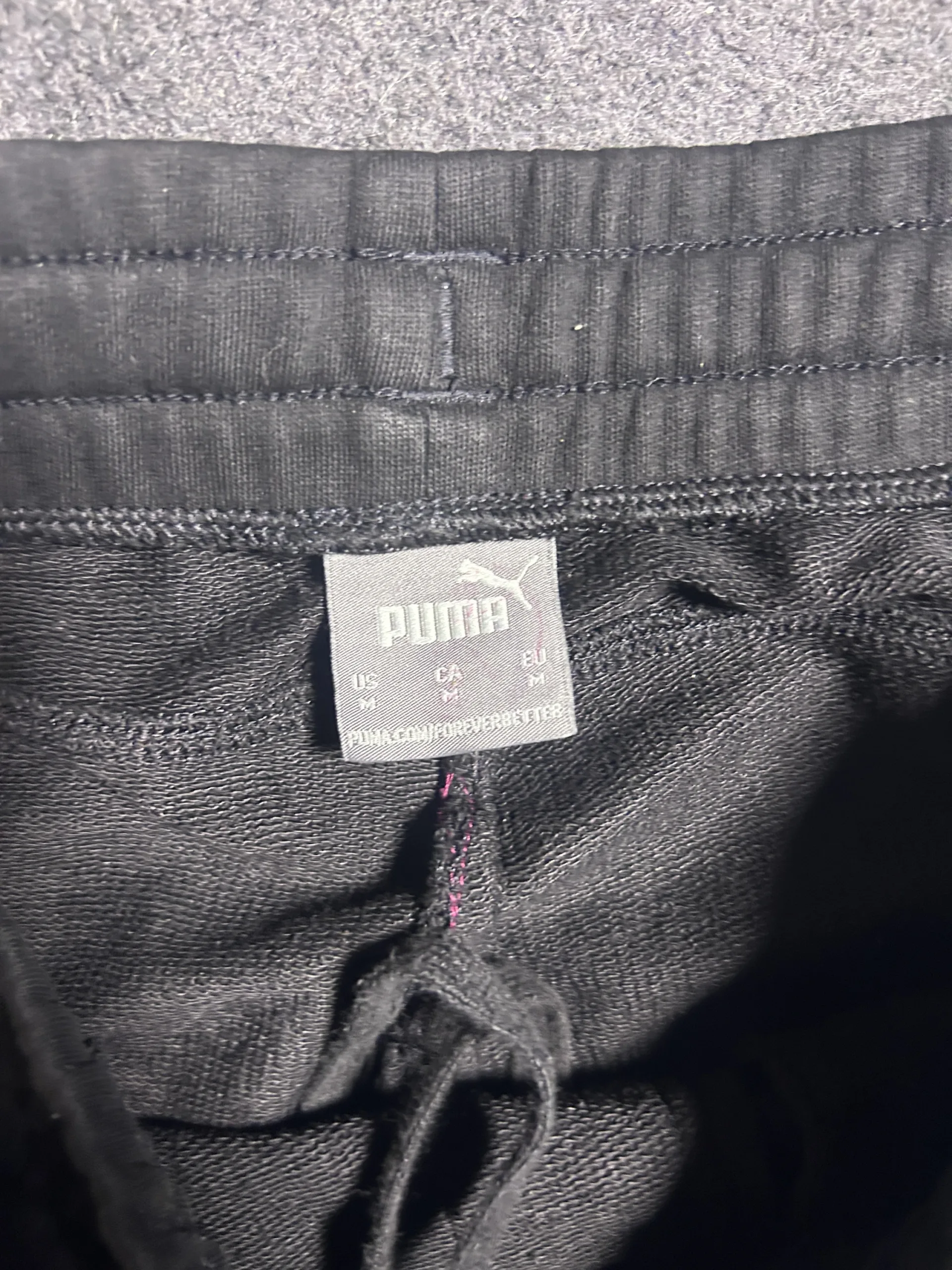 Puma Black Track Pants back view