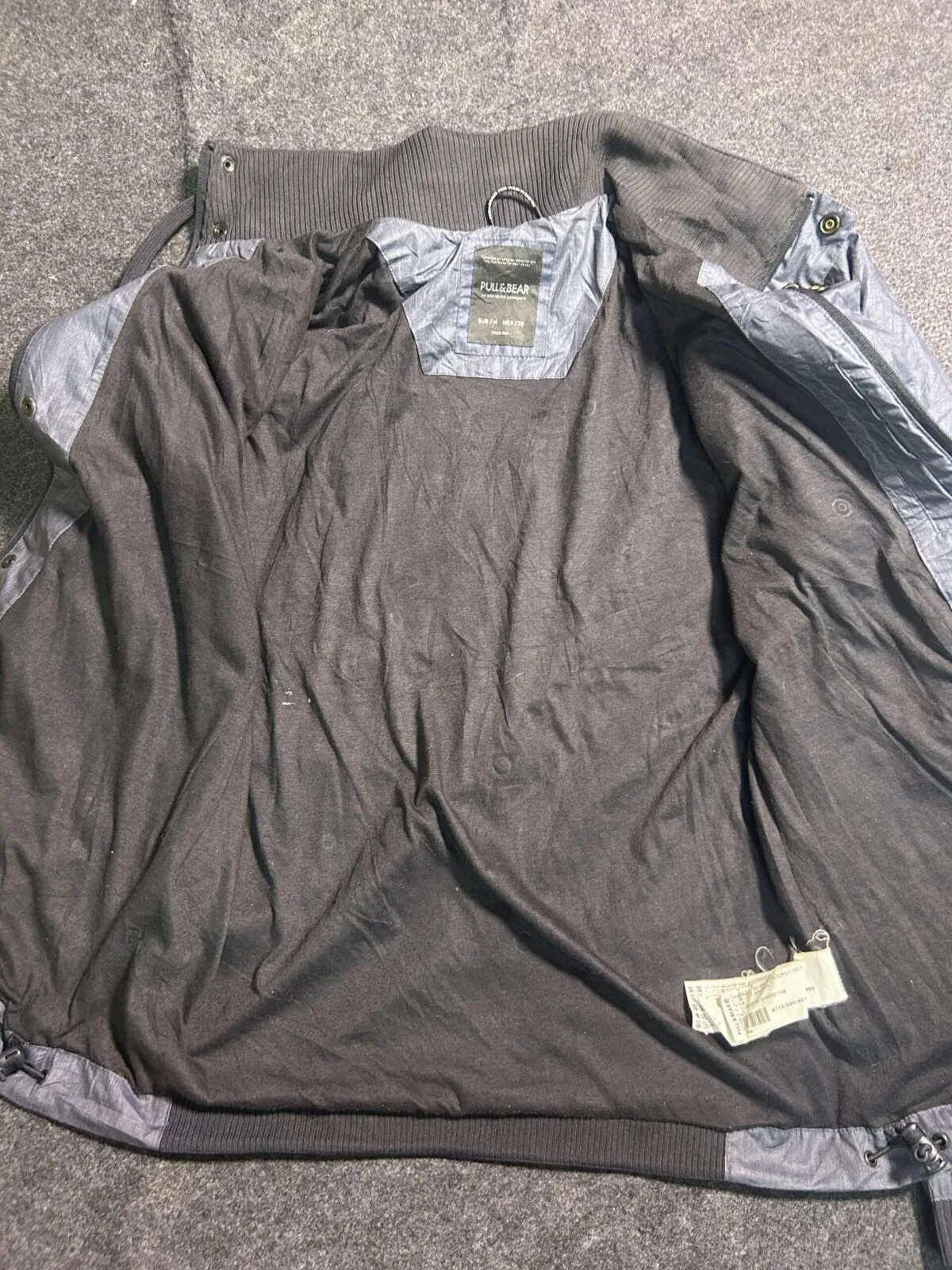 Grey Jacket detail view