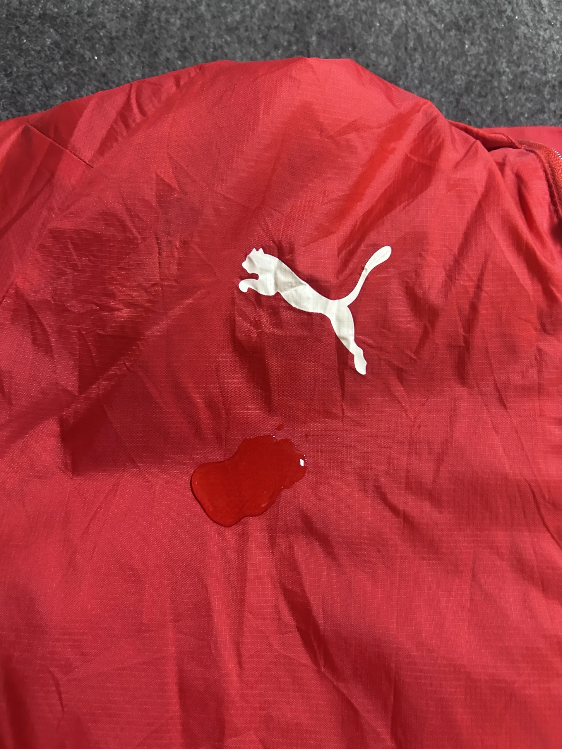 Puma Red Jacket detail view