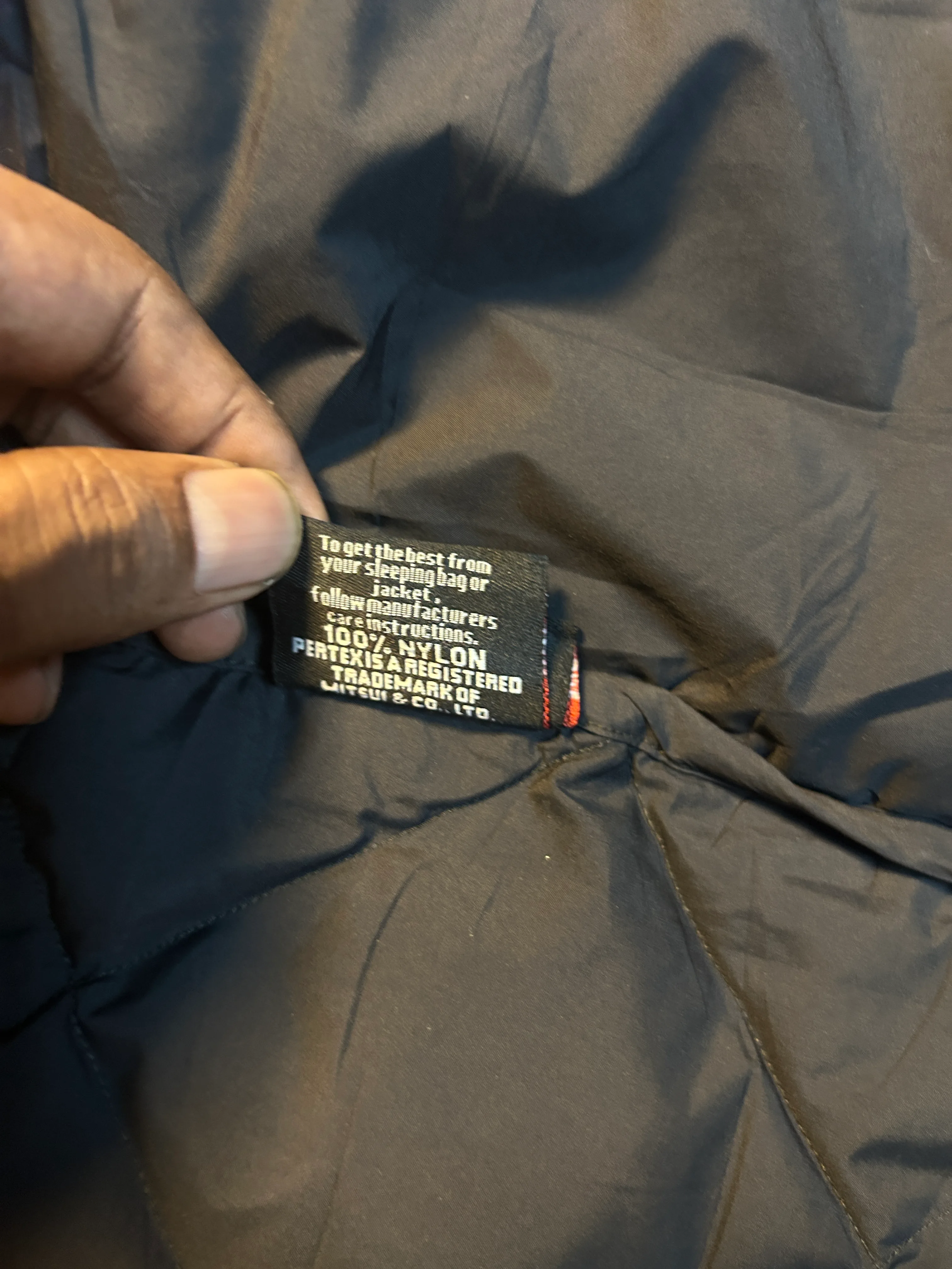 The North Face 900 Series Black Down Puffer Jacket detail view