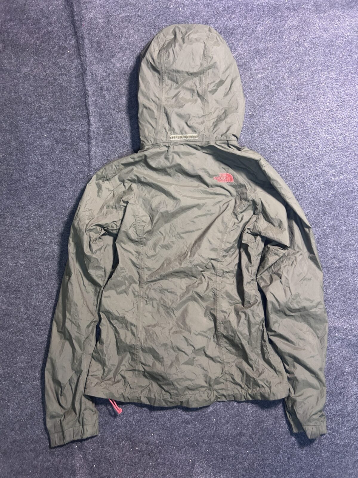 The North Face HyVent Green Jacket detail view