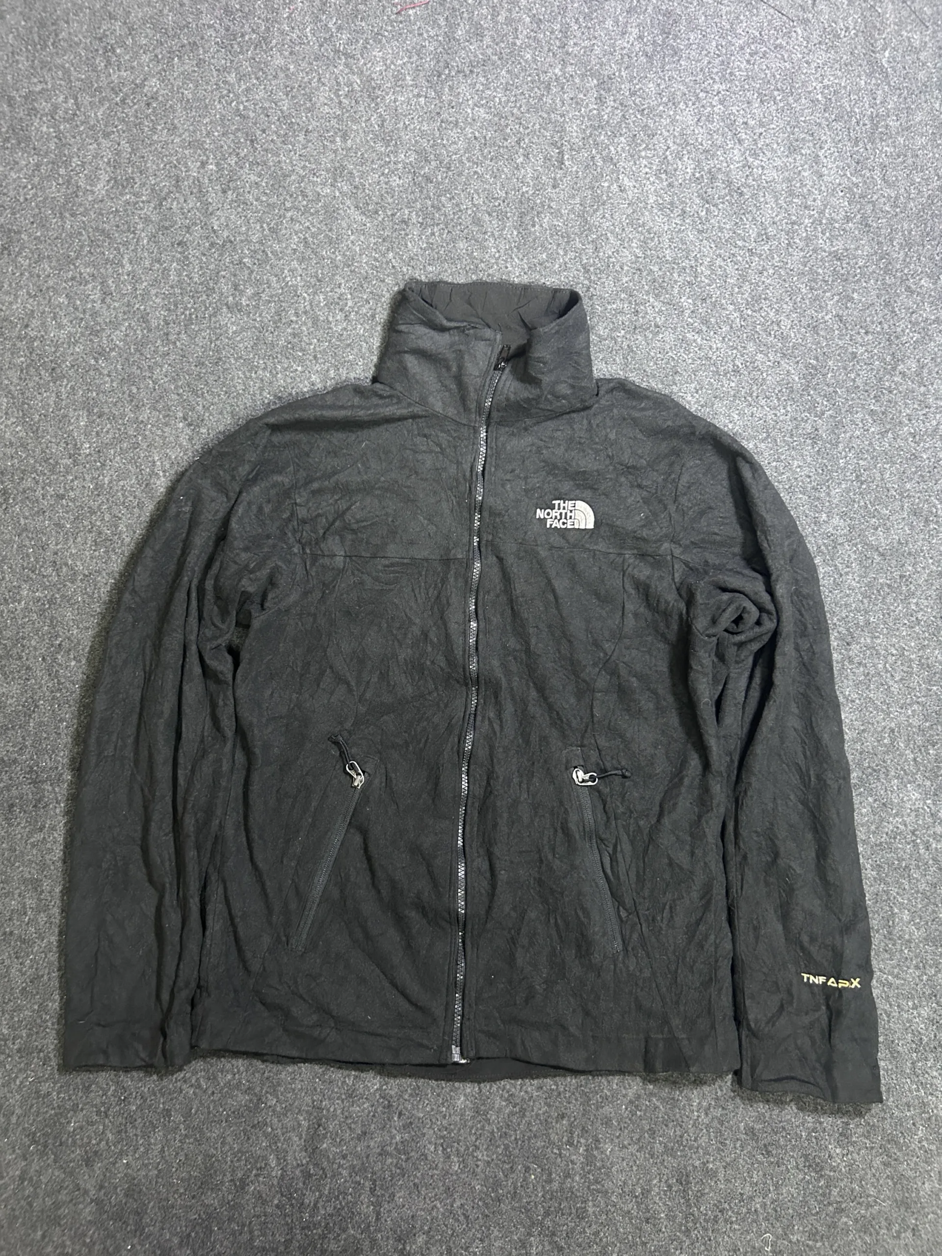 The North Face TNF Apex Black Softshell Jacket front view