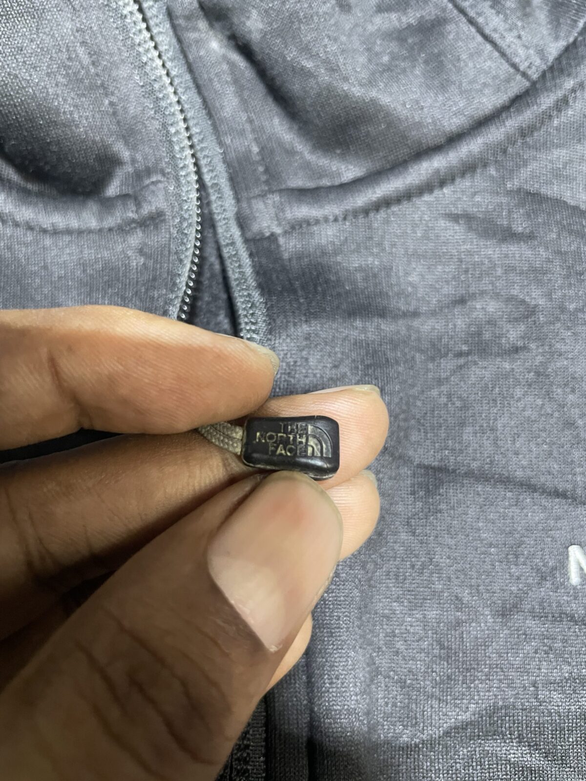 The North Face Black Track Jacket detail view
