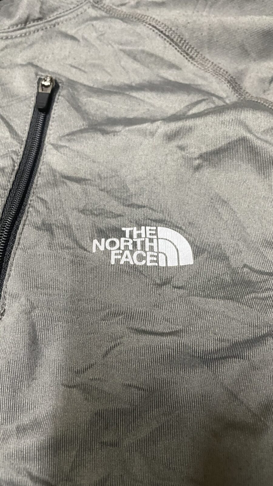 The North Face Grey Track Jacket detail view