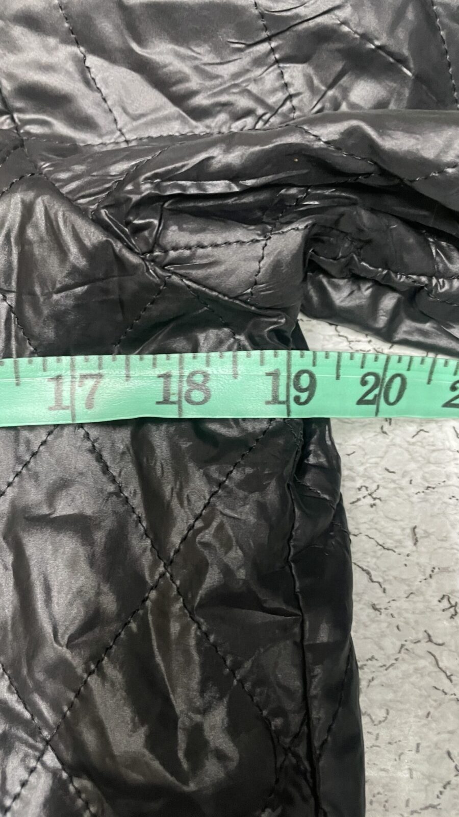 Black Puffer Jacket detail view