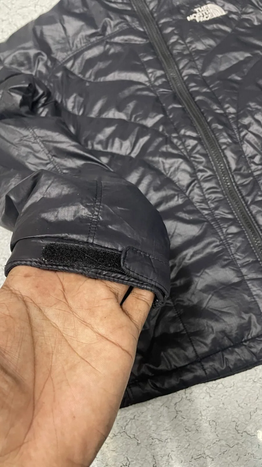 The North Face Puffer Jacket detail view