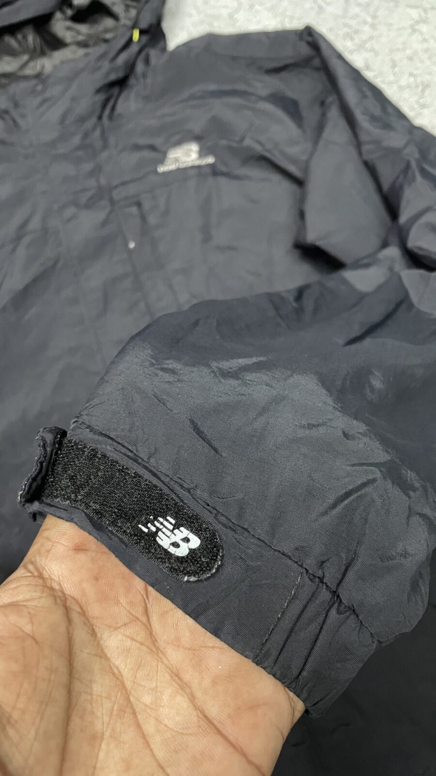 New Balance Black Jacket detail view