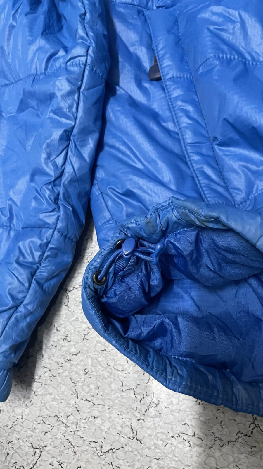 The North Face Blue Puffer Jacket back view