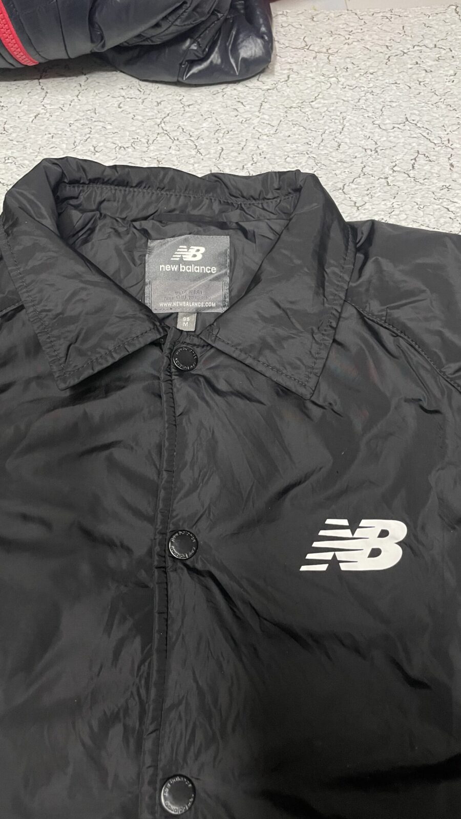 New Balance Black Jacket back view