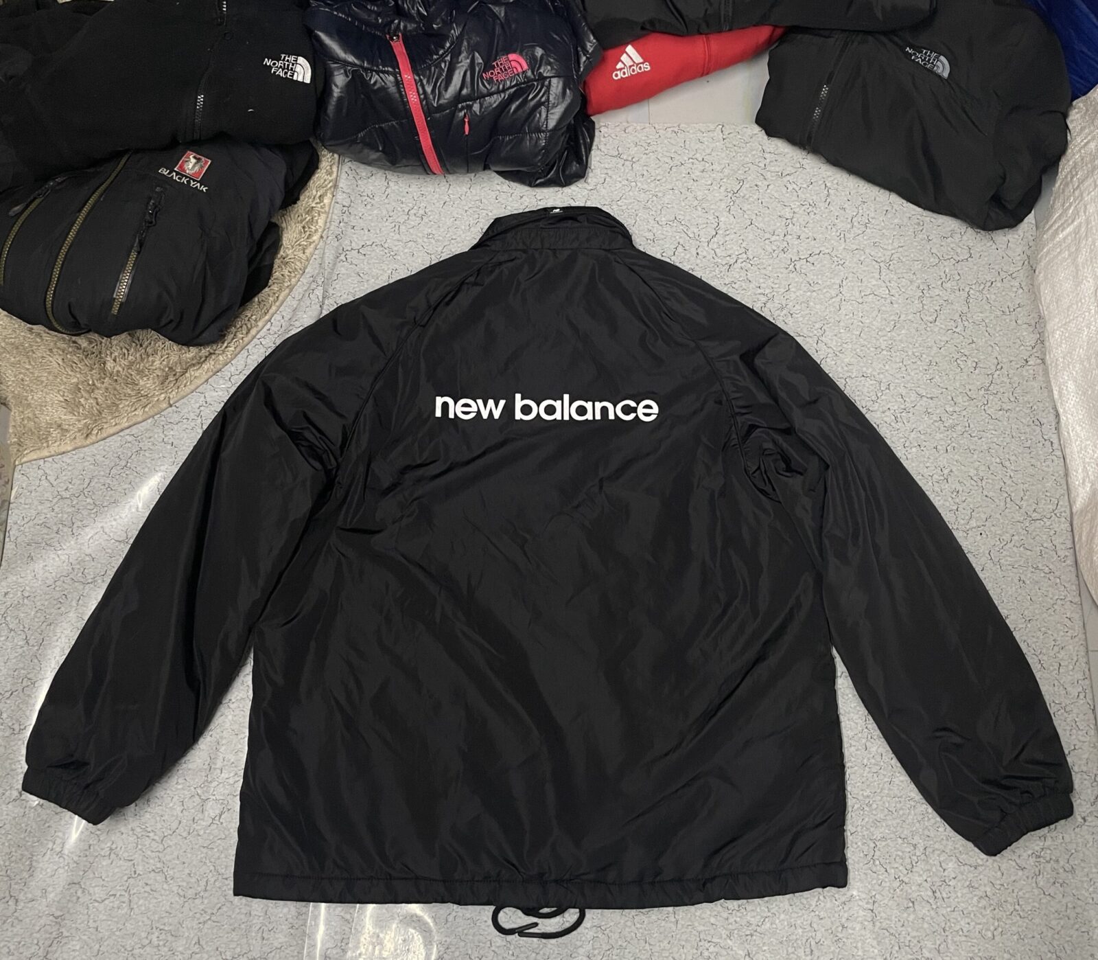 New Balance Black Jacket detail view