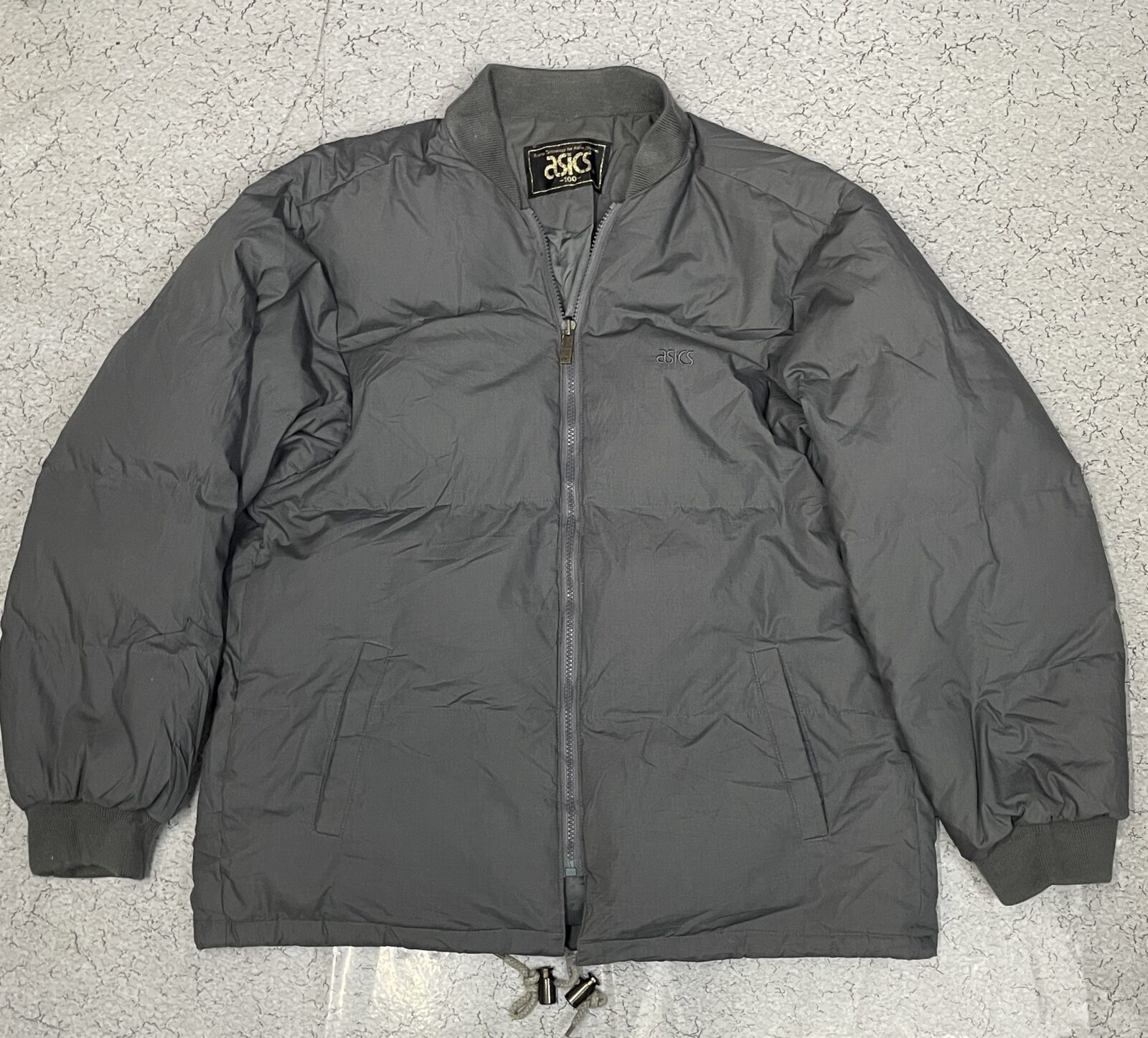 Asics Grey Puffer Jacket detail view