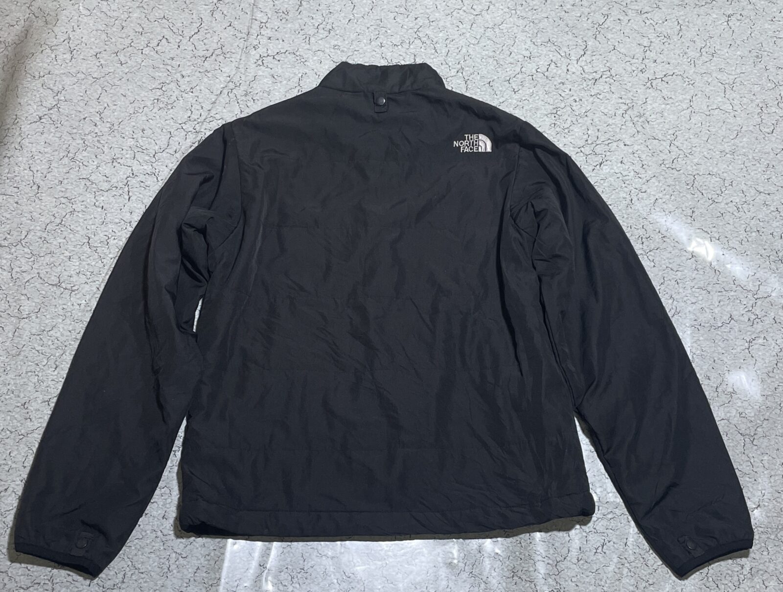 The North Face Black Jacket detail view