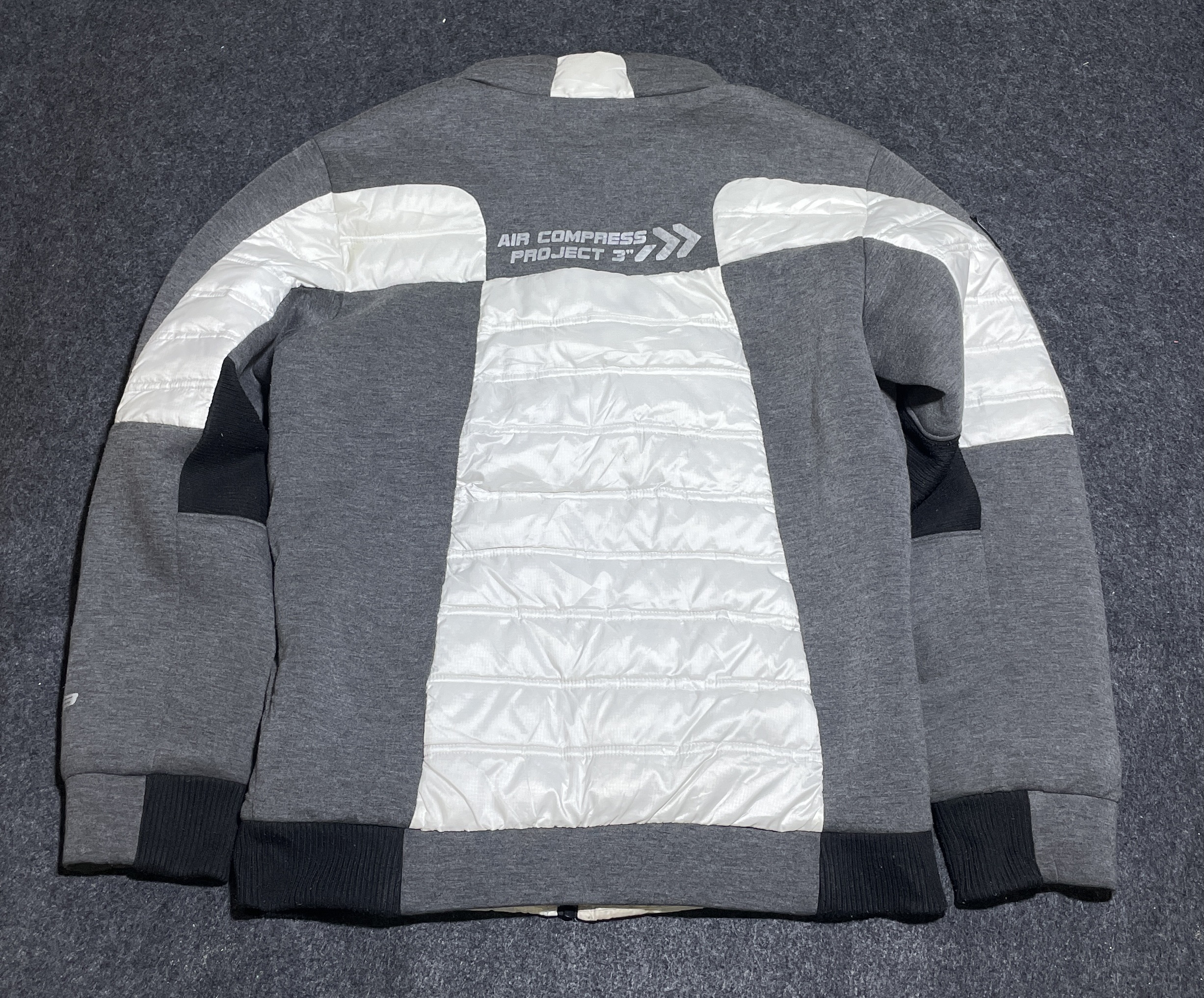 White Puffer Jacket detail view