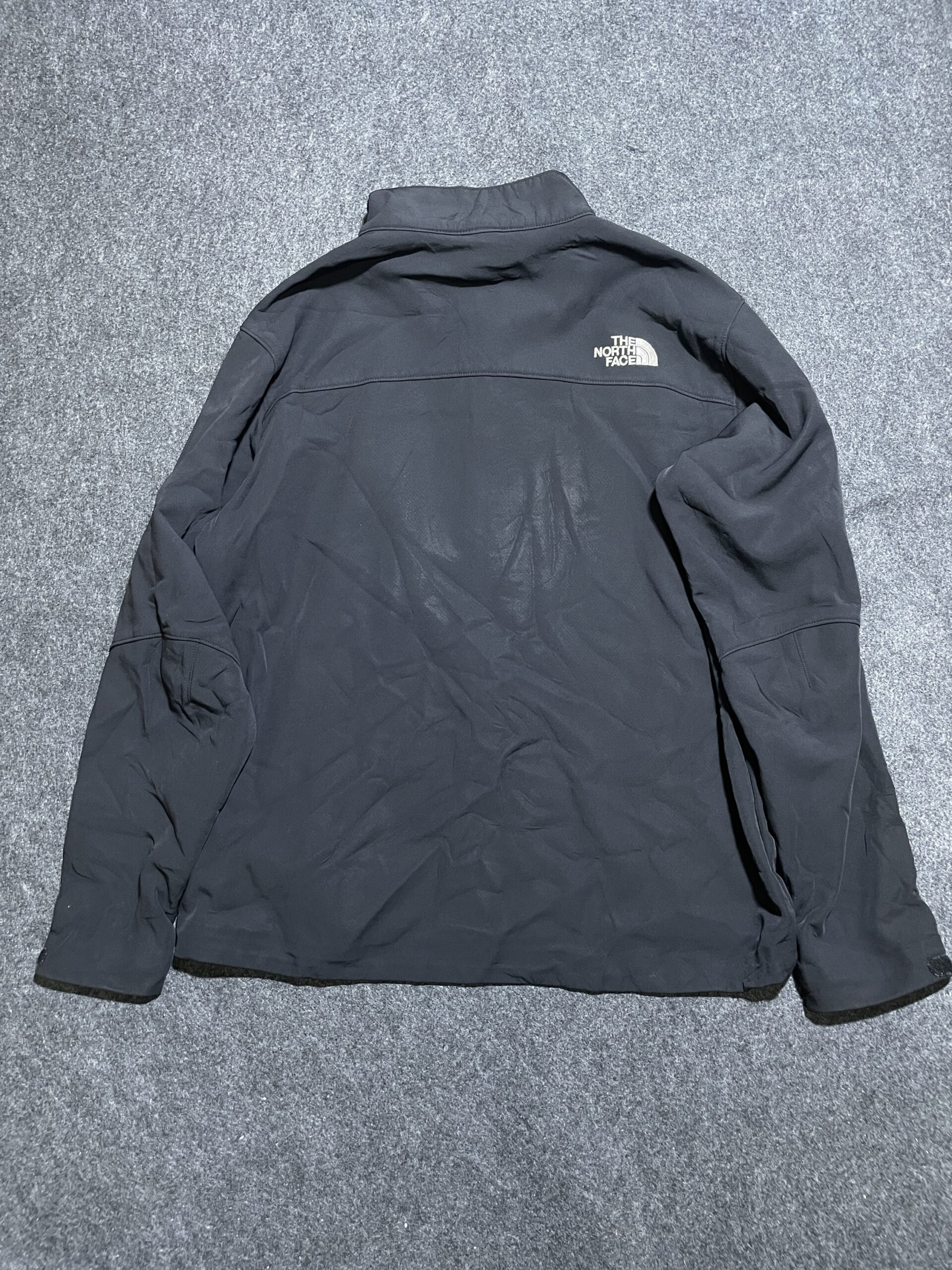 The North Face Black Softshell Jacket detail view