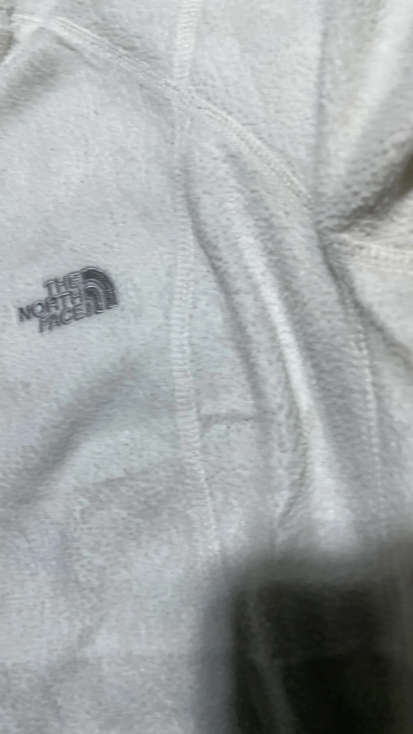 The North Face White Hoodie detail view
