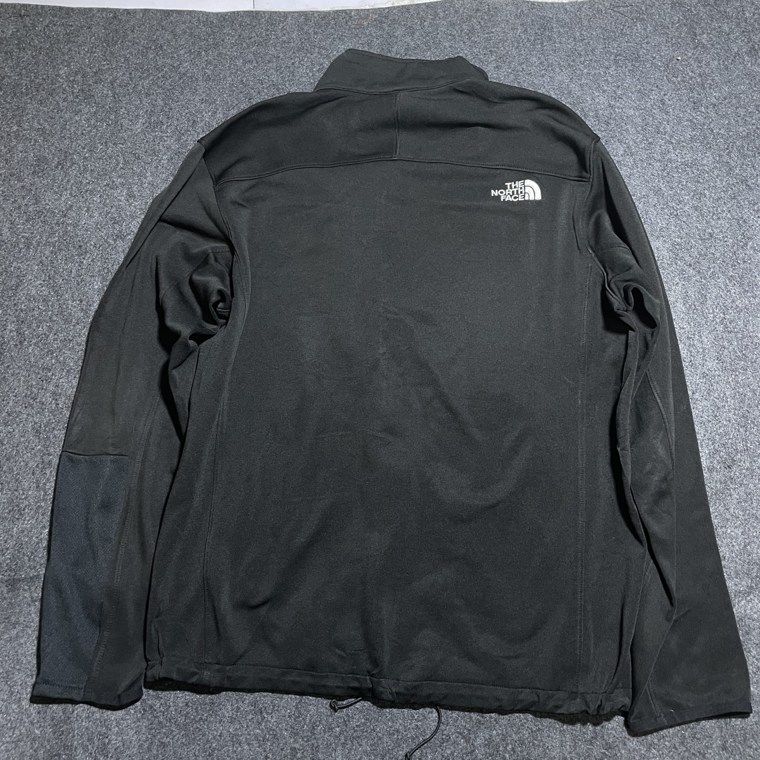 The North Face Black Track Jacket detail view