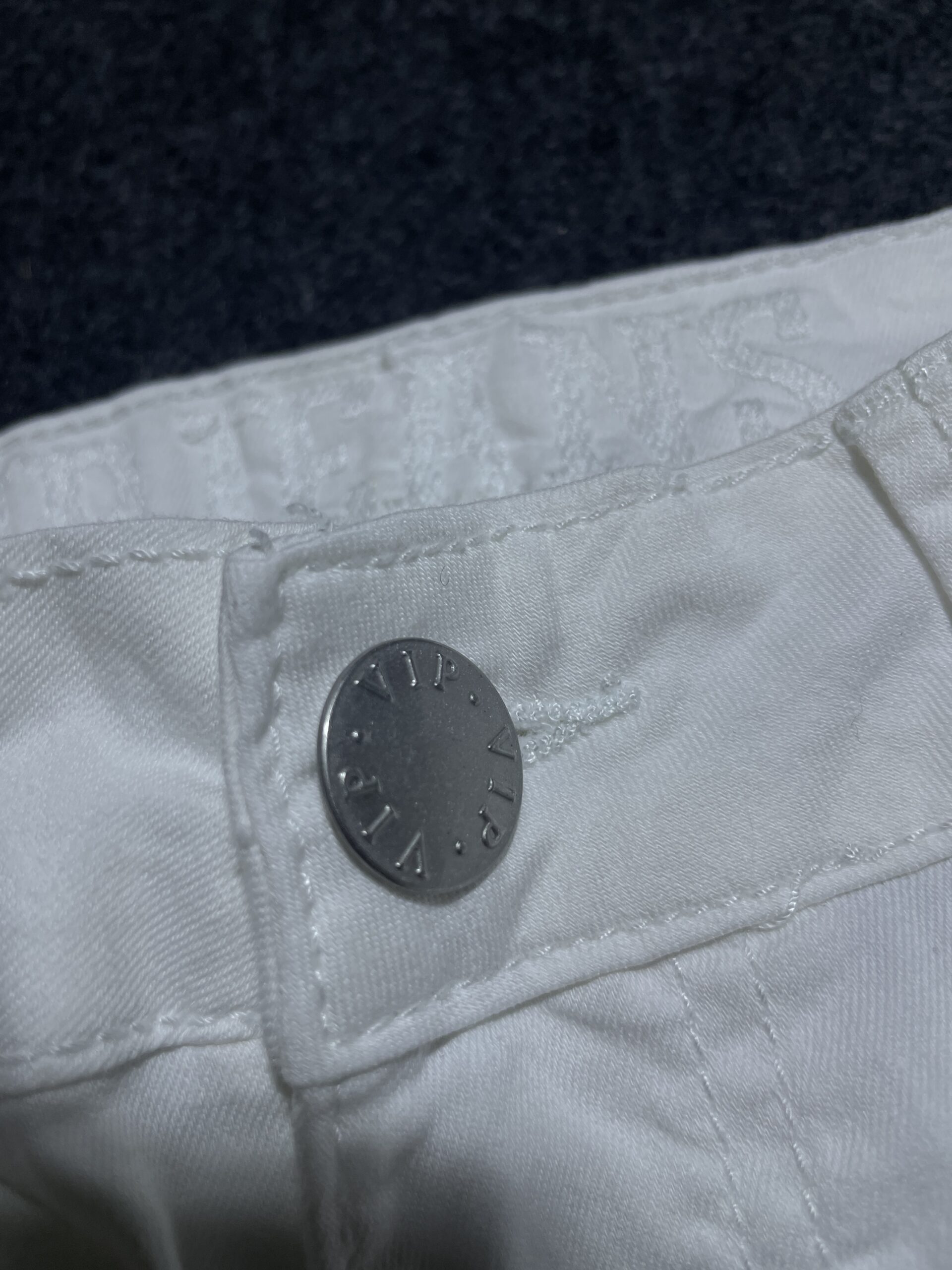 White Chinos detail view