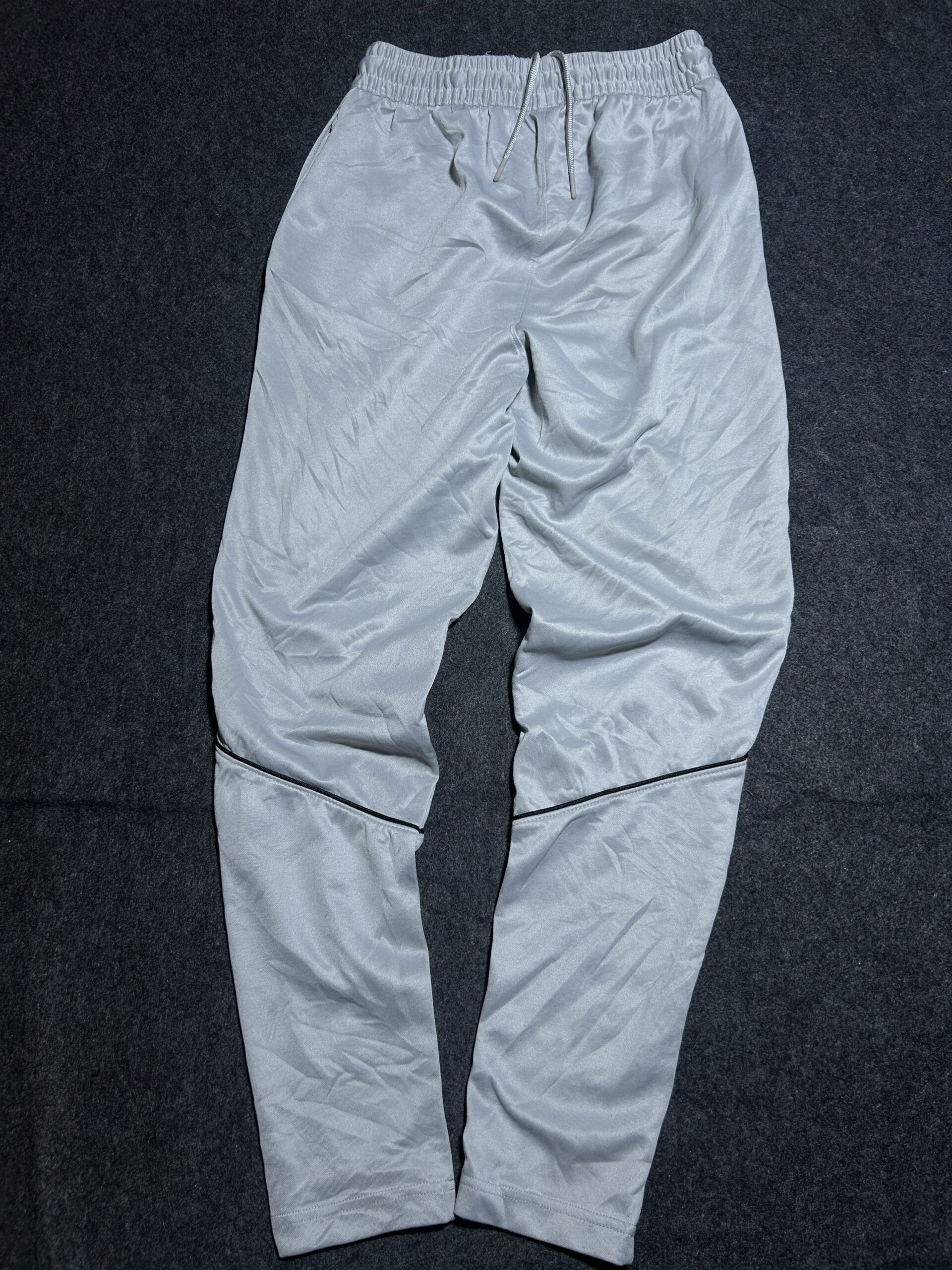Grey Track Pants detail view