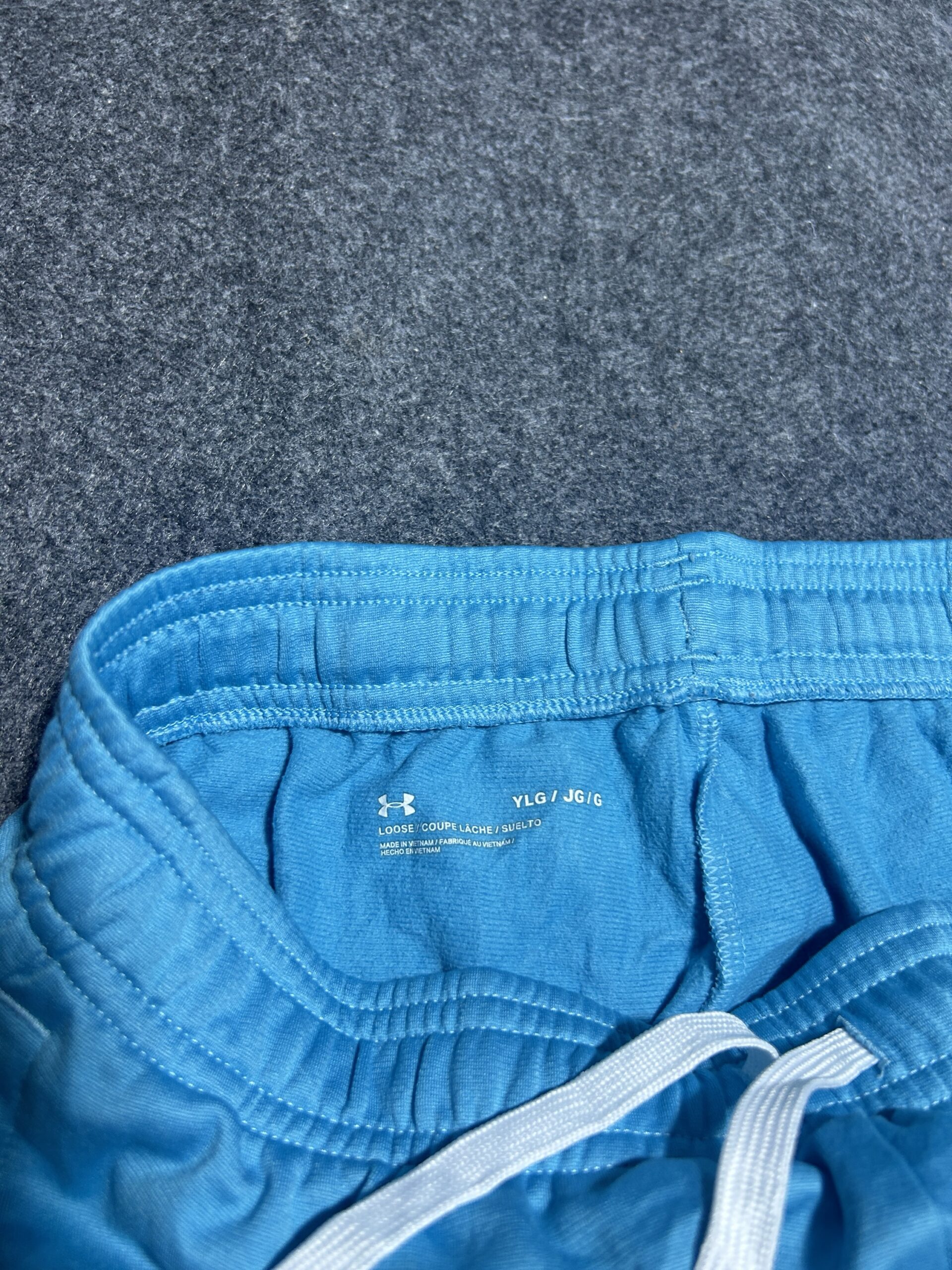 Under Armour Blue Track Pants back view